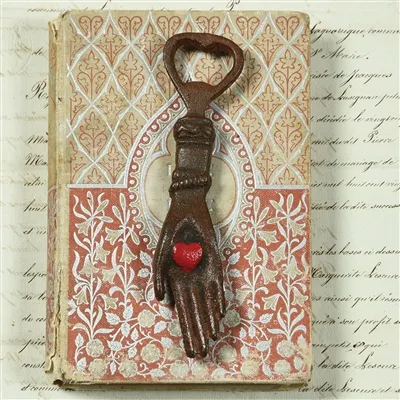 Hand With Heart Cast Iron Bottle Opener